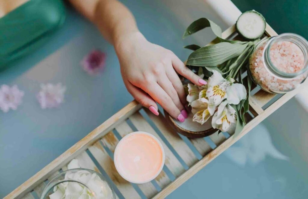 self care and wellness with woman soaking in tub with spa treatment